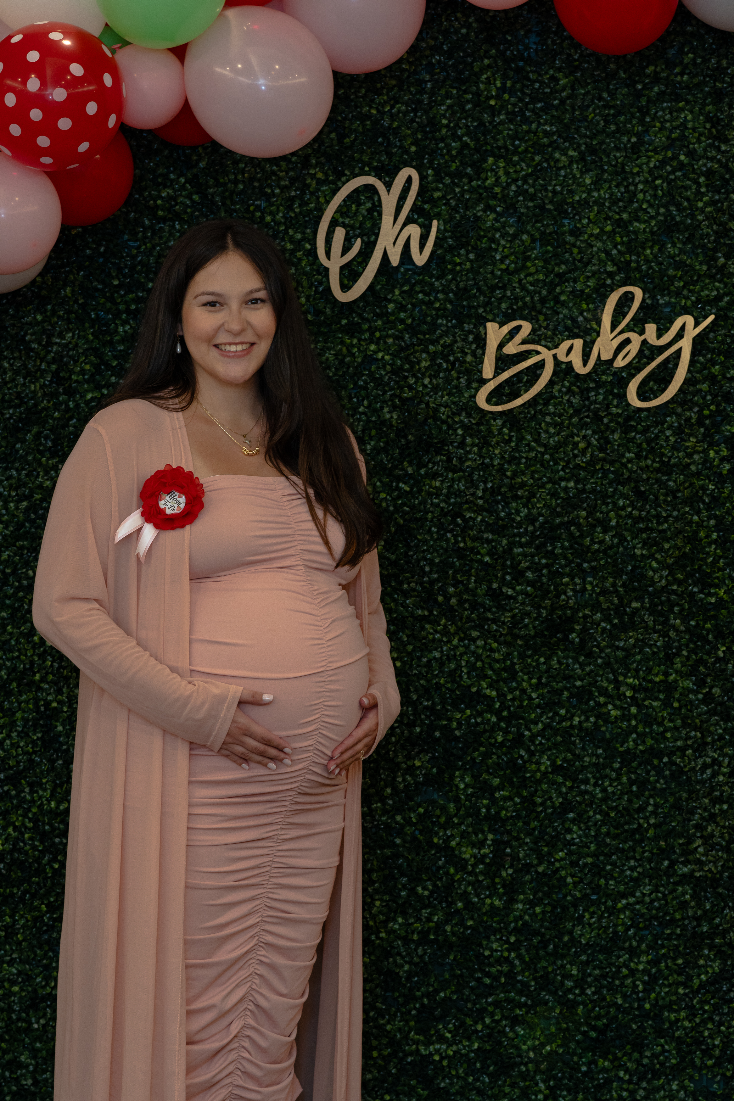 Portrait of a woman at her baby shower during a lifestyle photography session